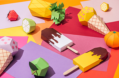 Origami,Ice,Cream,And,Handmade,Cardboard,Fruits,On,Multicolored,Paper